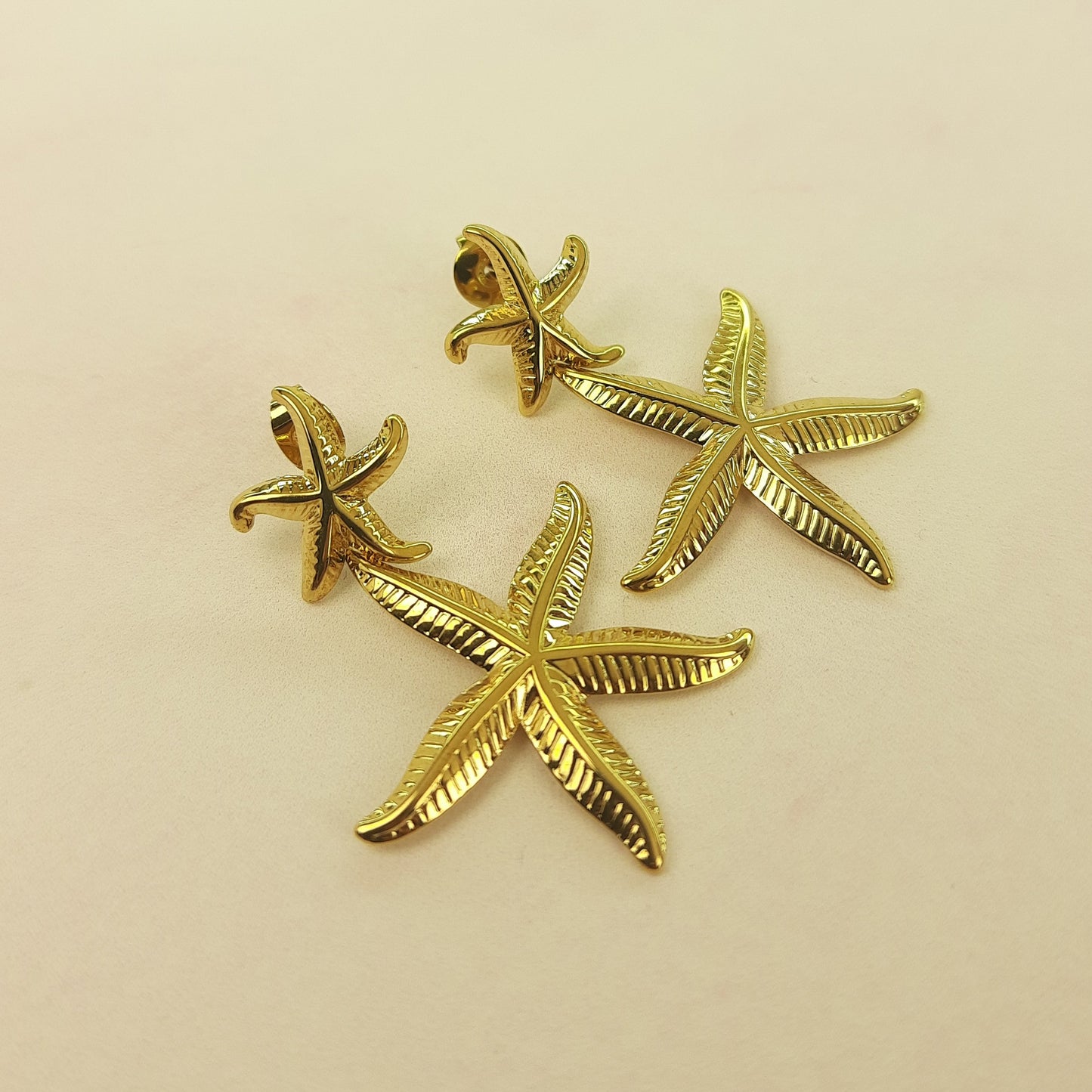 ARETE DOBLE ESTRELLA COLGANTE