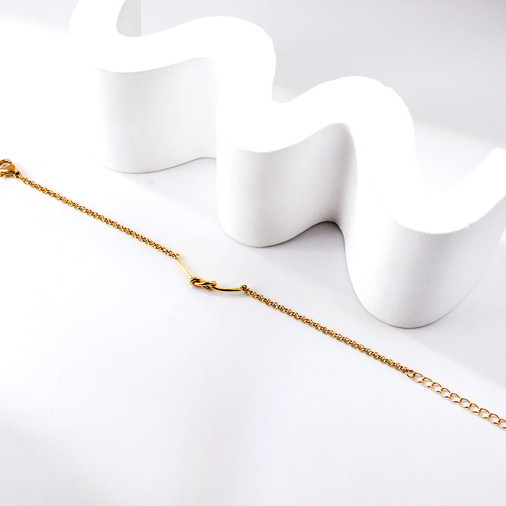 PULSERA NUDO DORADA