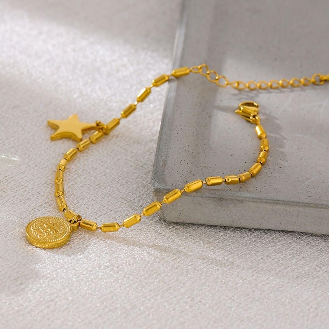 Pulsera charms moneda y estrella