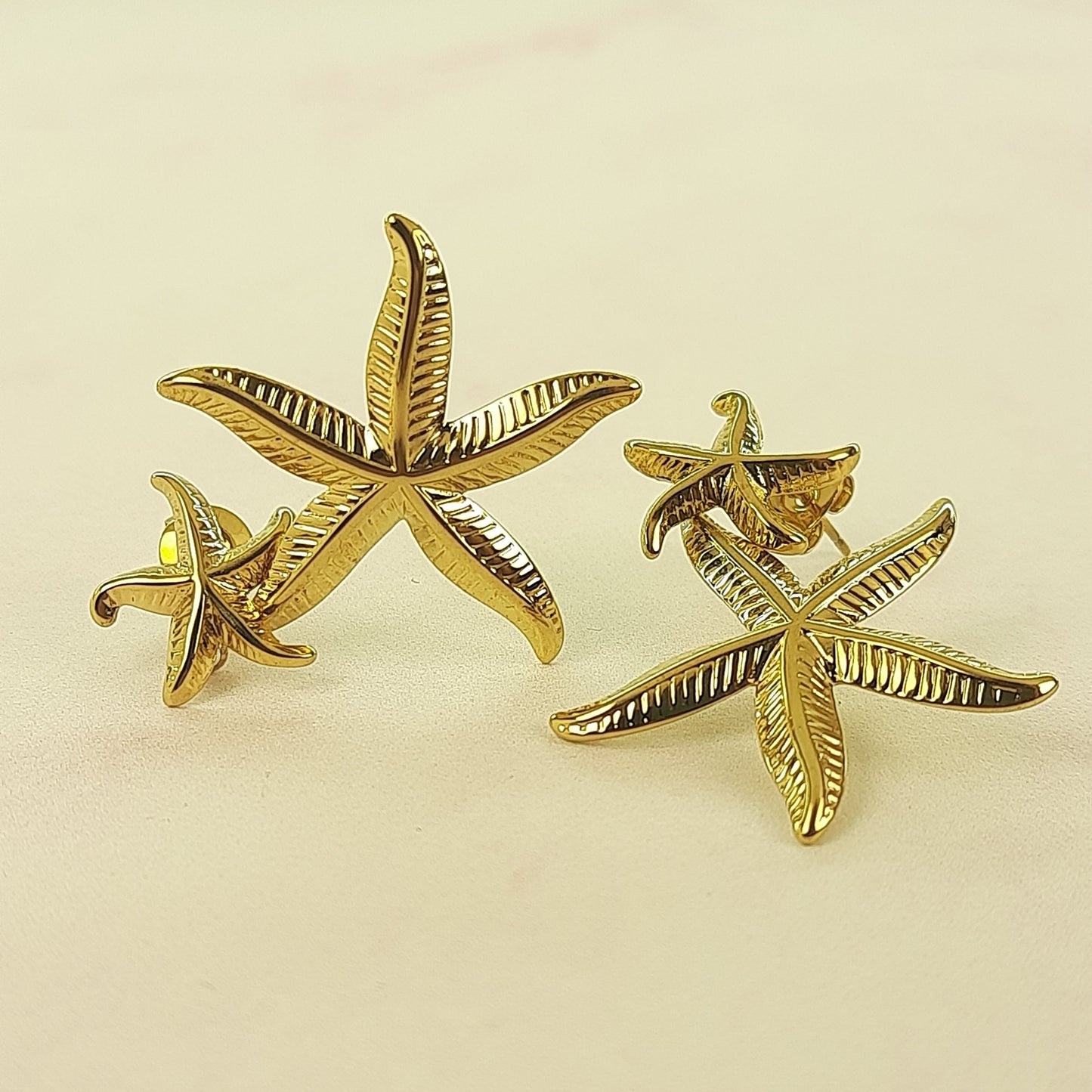 ARETE DOBLE ESTRELLA COLGANTE