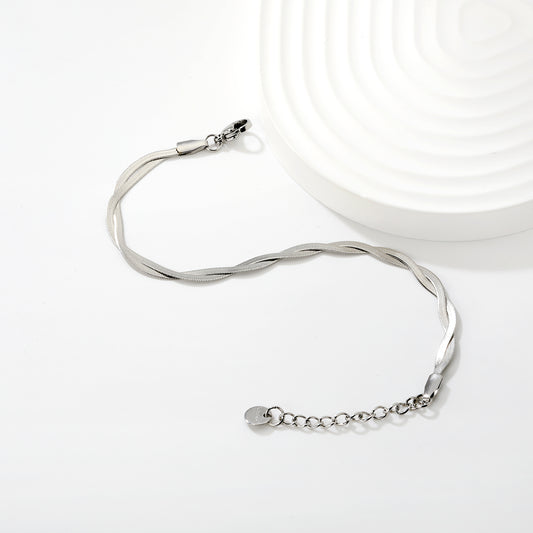 PULSERA PLANCHADA TRENZADA PLATEADA