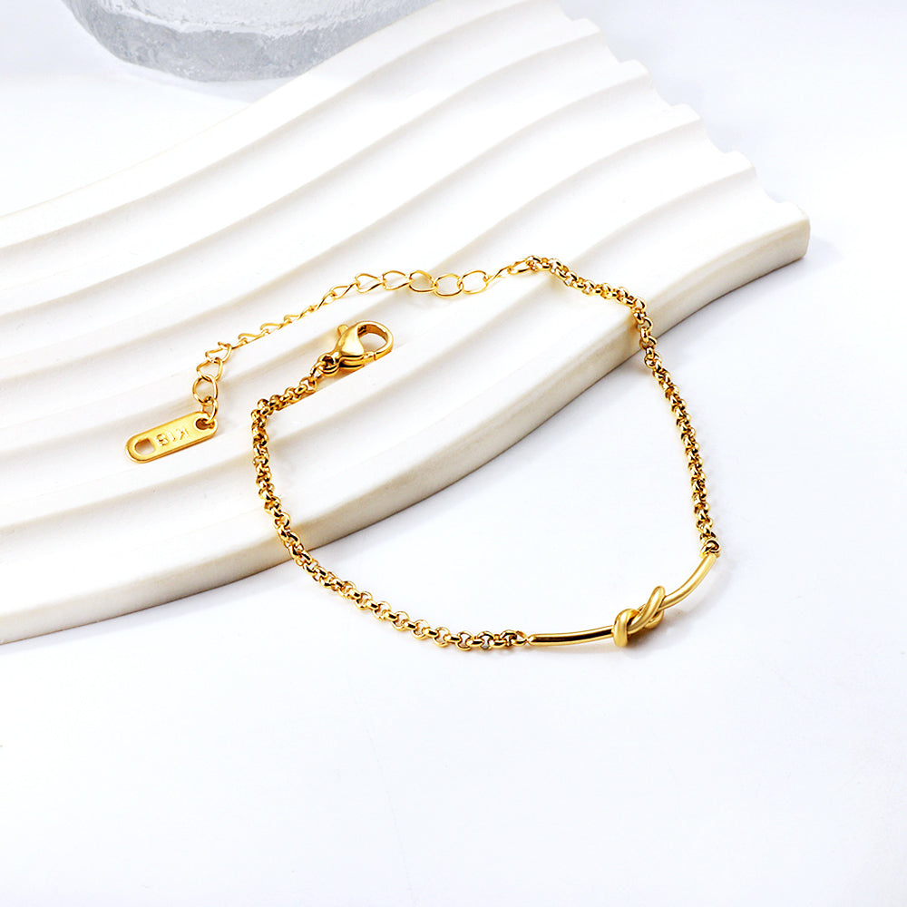 PULSERA NUDO DORADA