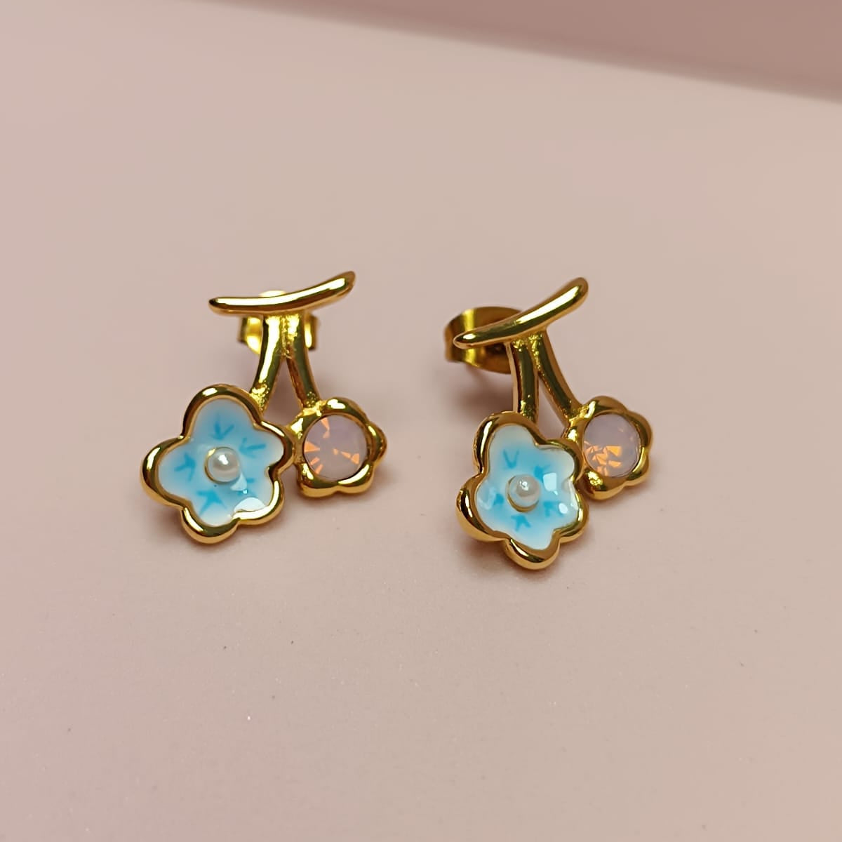 ARETE FLOR ESTAMLTADA ROSA AZUL