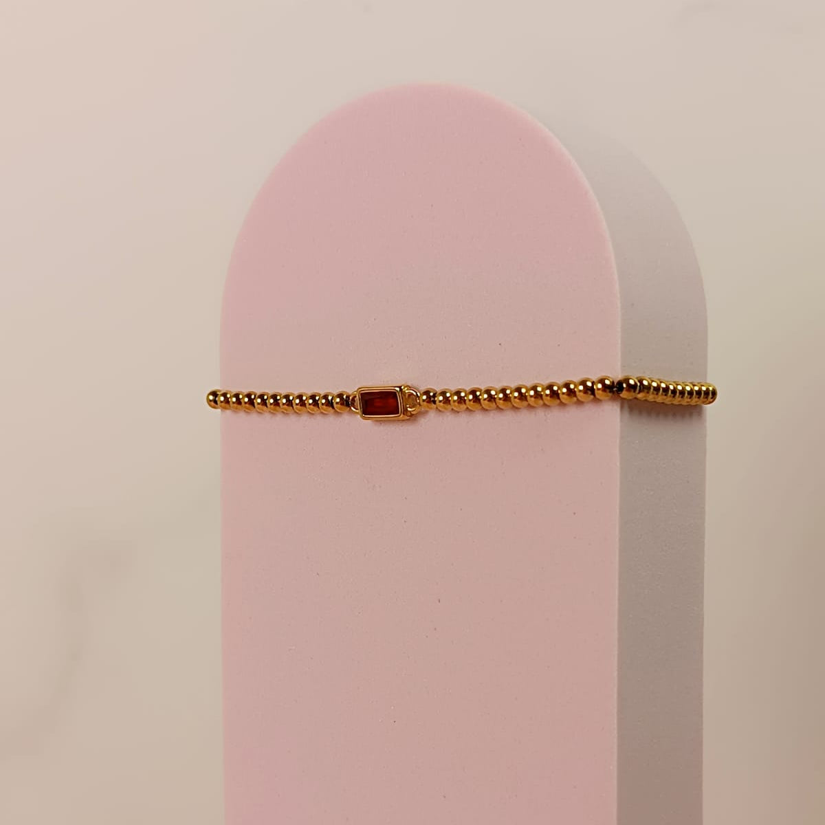 PULSERA BAGUETTE ROJA BOLITAS DORADA