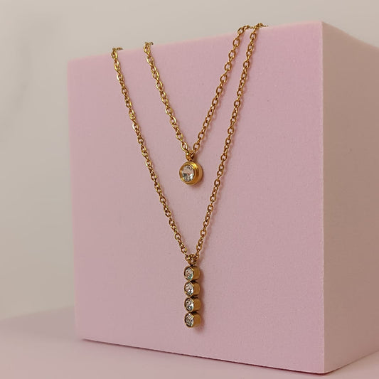 COLLAR DOBLE BARRA 4 ZIRCONIAS DORADO