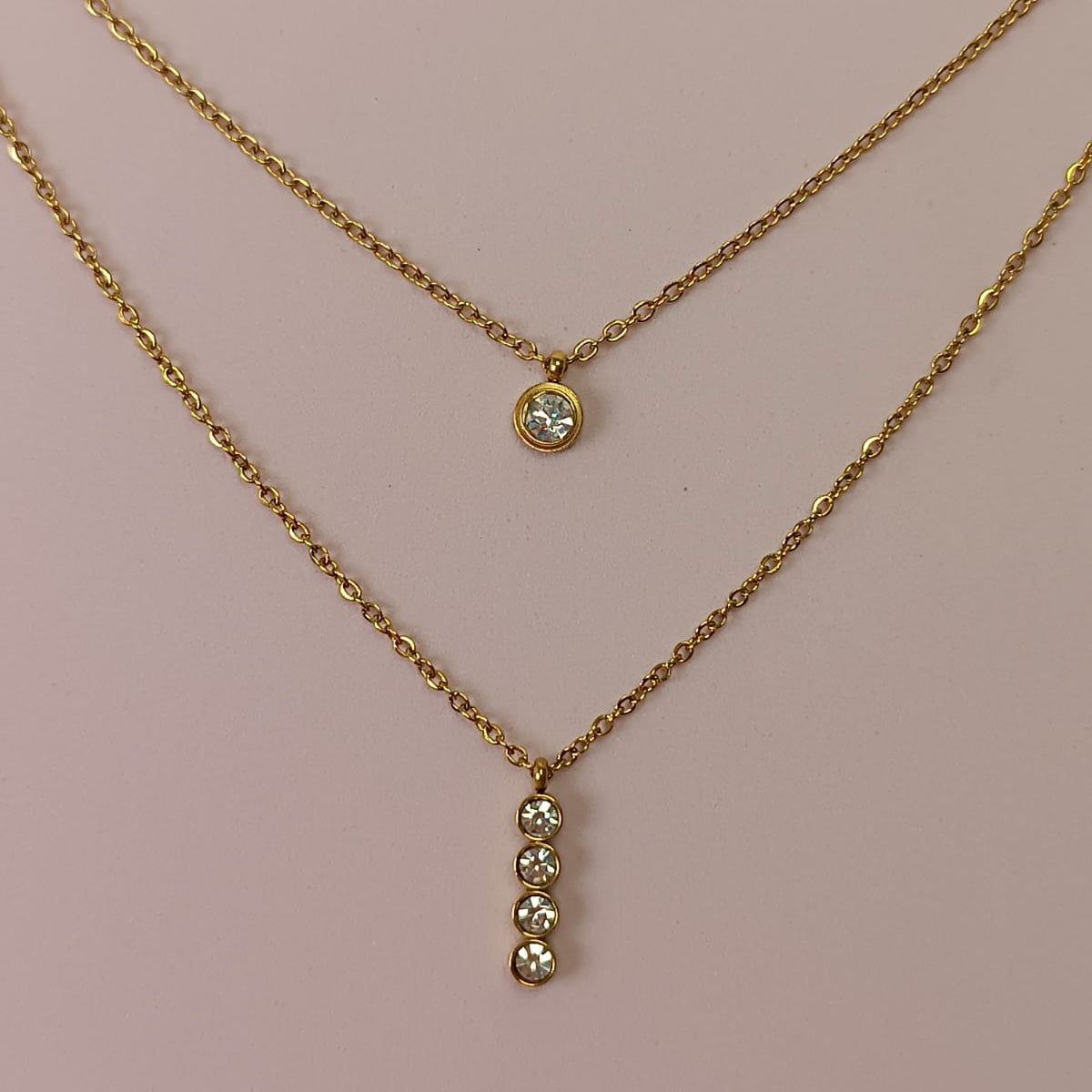 COLLAR DOBLE BARRA 4 ZIRCONIAS DORADO