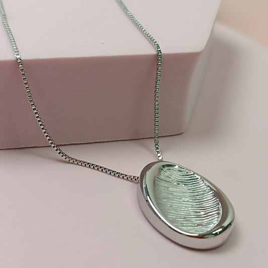 COLLAR OVALO CEPILLADO PLATEADO